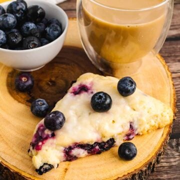 Blueberry Lemon Scone served with fresh berries and coffee.