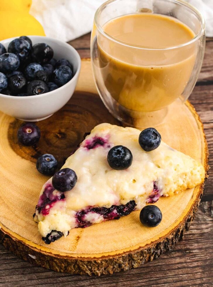 Blueberry Lemon Scone served with fresh berries and coffee.