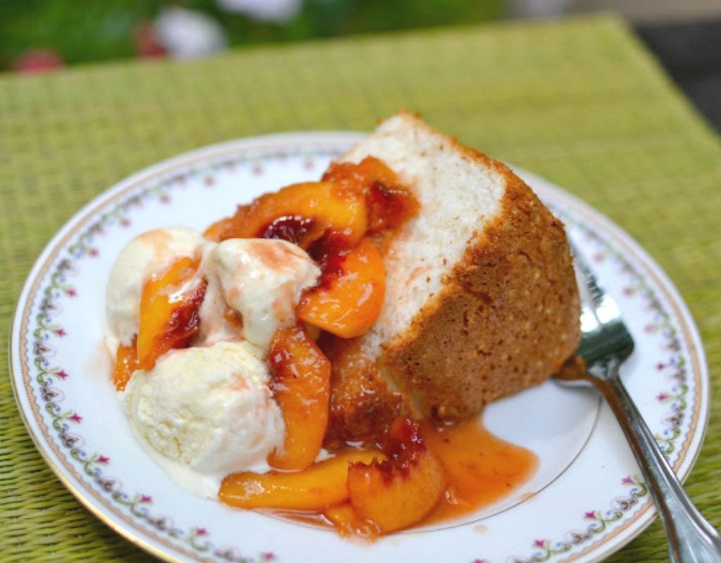 Grilled Peach Sauce made with fresh peaches, brown sugar, honey and cinnamon is perfect with ice cream or cake.