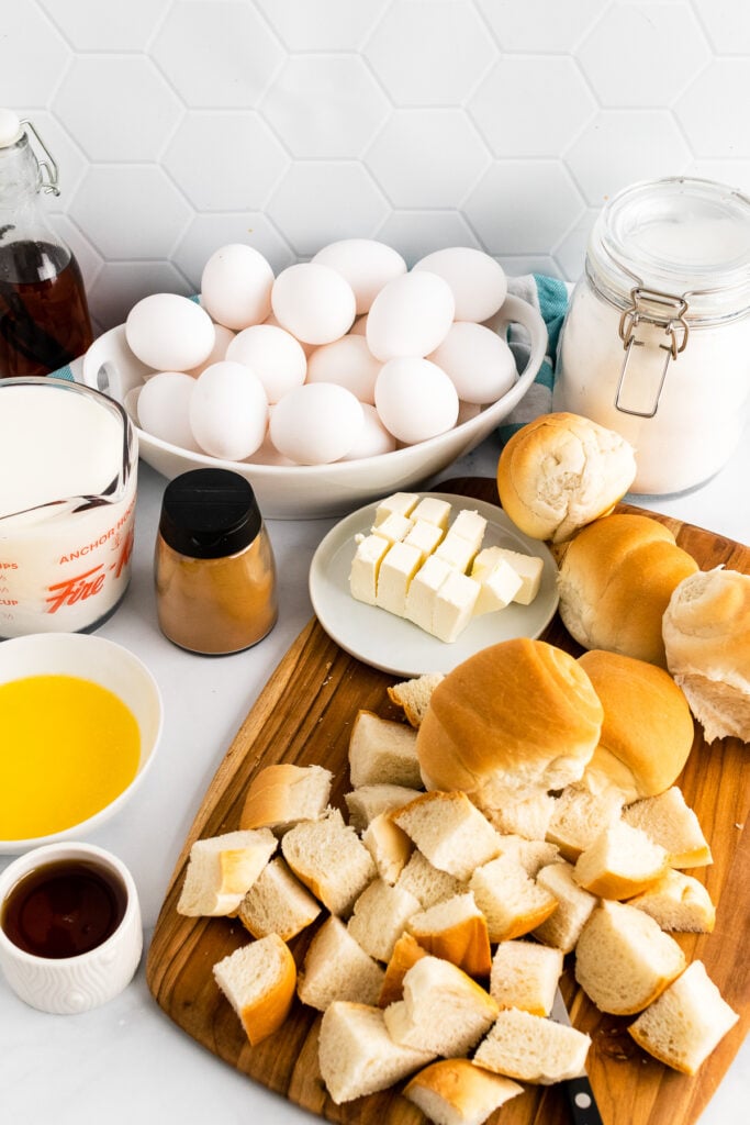 French Toast Bread Pudding ingredients with bread and eggs.
