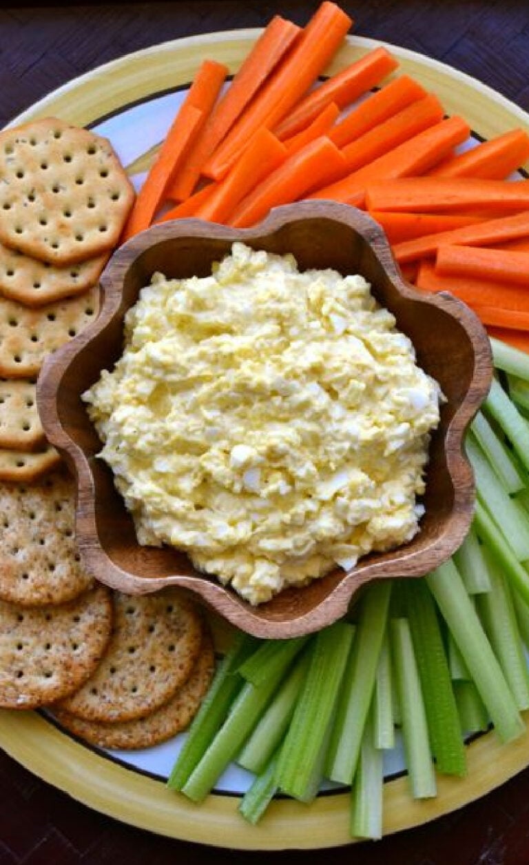 Deviled Egg dip served with carrots, celery and crackers is the perfect spring appetizer.