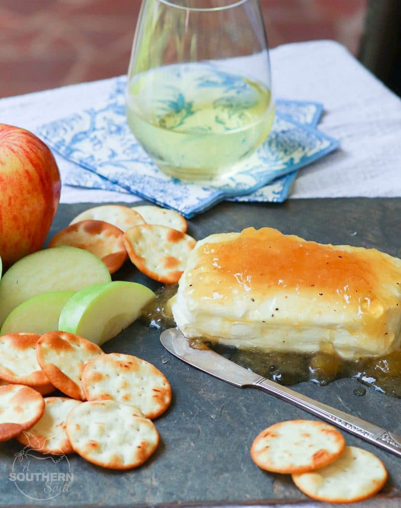 Jezebel Sauce made with pineapple preserves, apple jelly, horseradish, dry mustard and pepper is delicious as an appetizer or sauce for meat.
