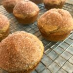 Freshly baked Whole Wheat Applesauce Muffins with cinnamon sugar coating cooling on a wire rack
