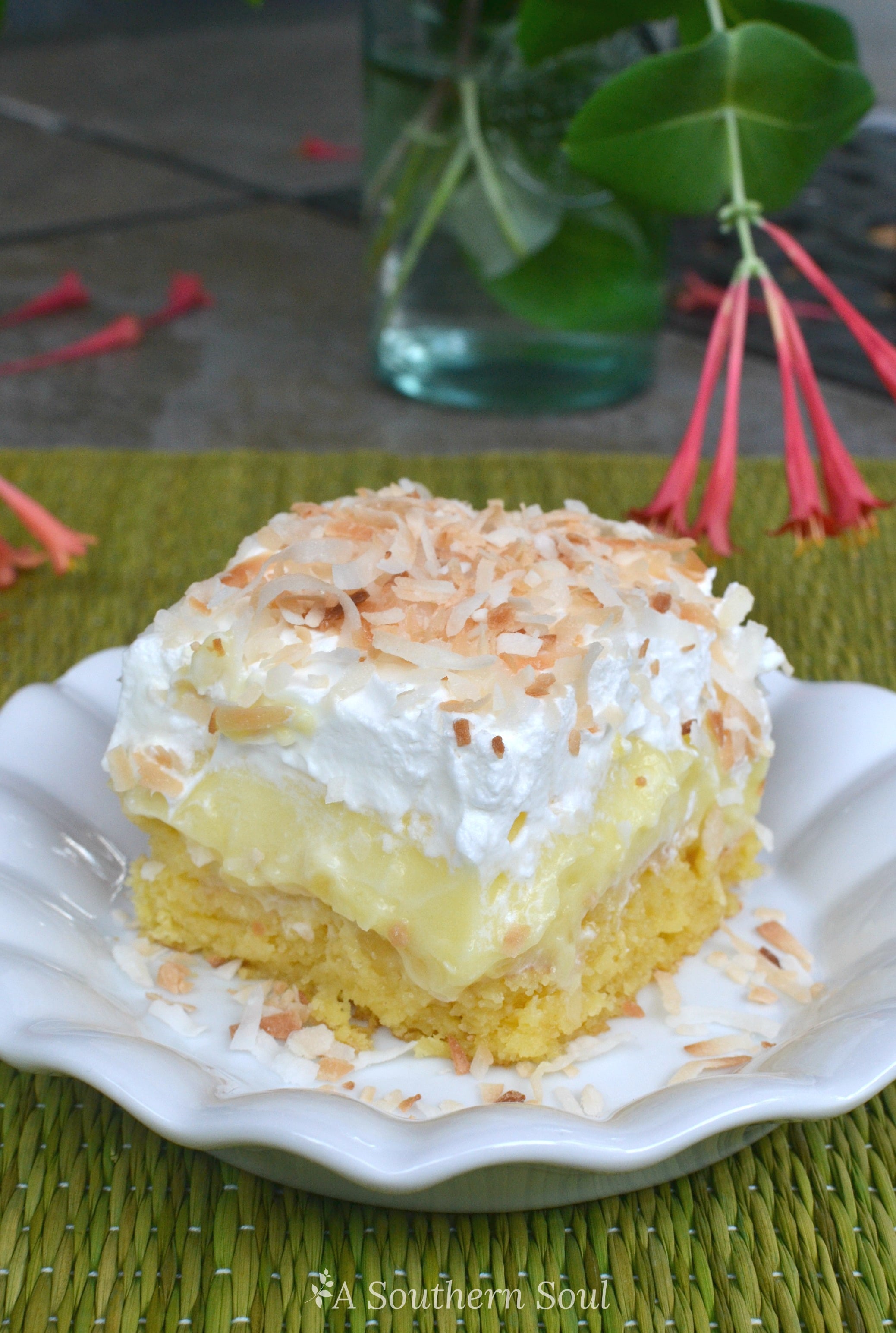 pineapple coconut poke cake table