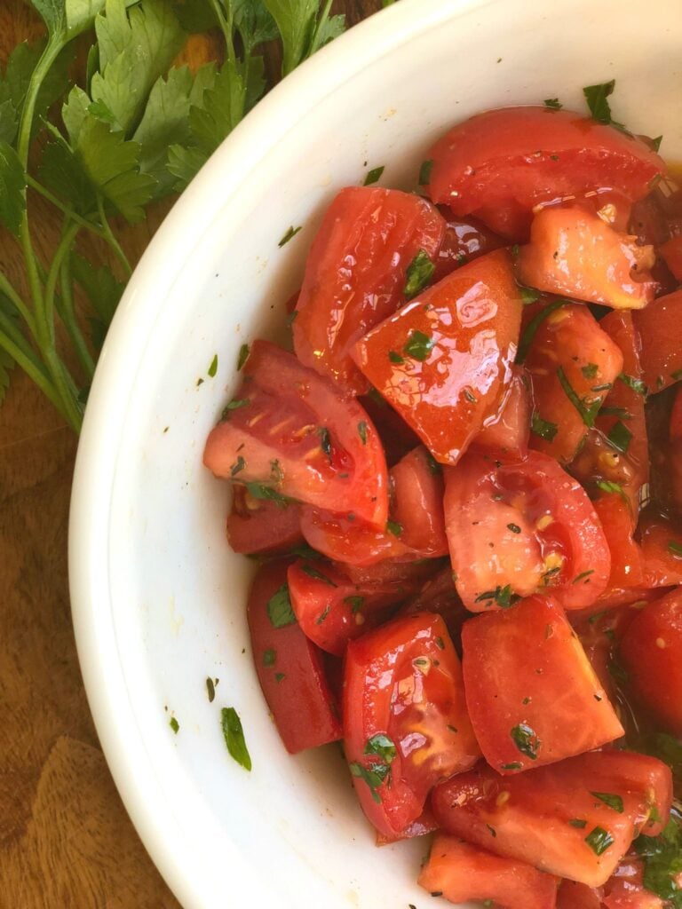 marinated tomatoes in a fresh herbal dressing