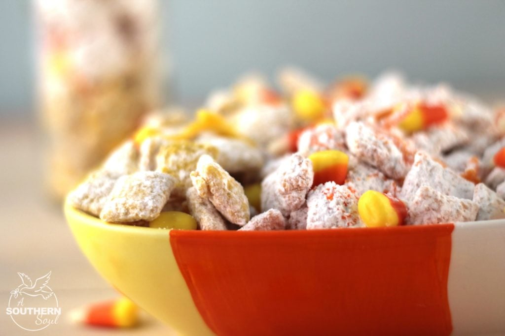 Candy corn Muddy Buddy snack mix is loaded with sweetness. It's a crunchy treat that everyone will love.