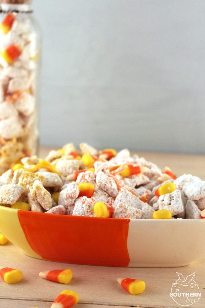 Candy corn Muddy Buddy snack mix is loaded with sweetness. It's a crunchy treat that everyone will love.