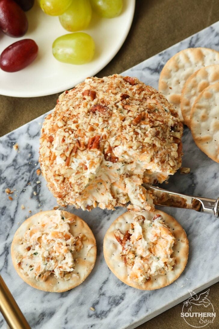 Cheddar & Chive Ball is an easy to make appetizer that's perfect for any gathering. It freezes beautifully so that you've throw a party at the drop of a hat!