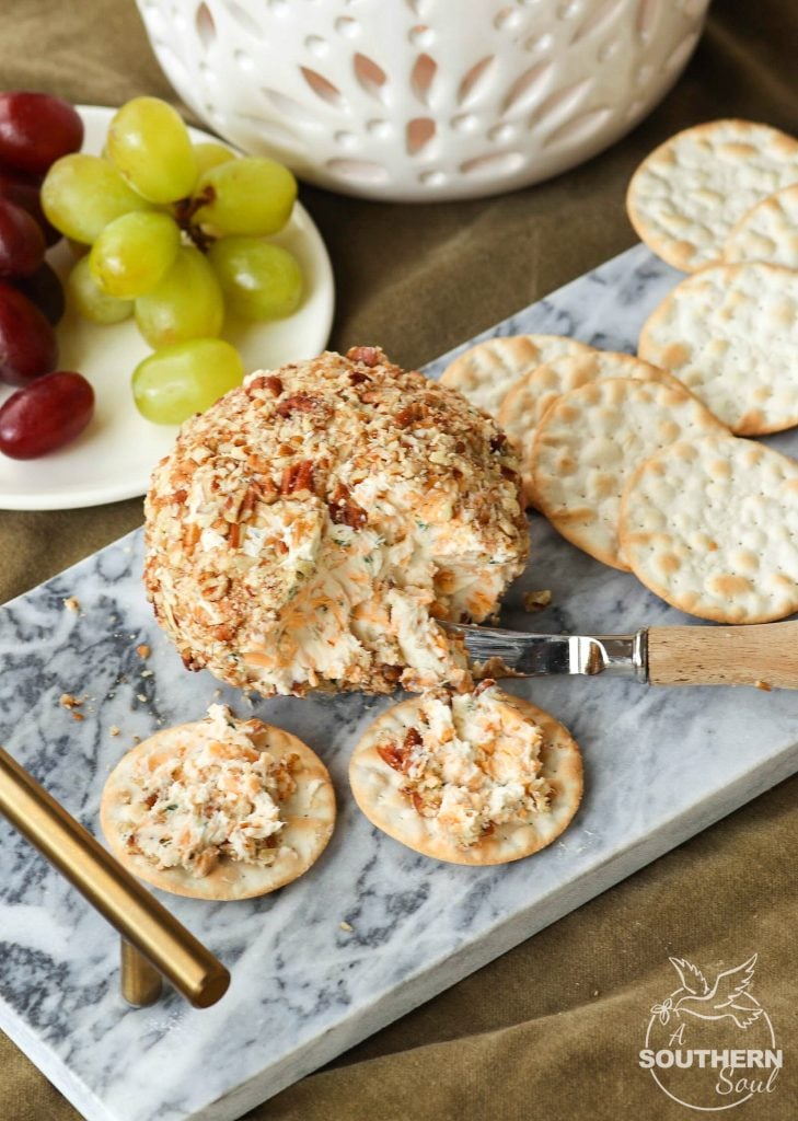 Cheddar & Chive Ball is an easy to make appetizer that's perfect for any gathering. It freezes beautifully so that you've throw a party at the drop of a hat!