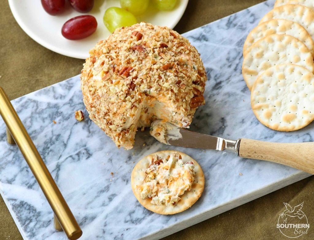 Cheddar & Chive Ball is an easy to make appetizer that's perfect for any gathering. It freezes beautifully so that you've throw a party at the drop of a hat!