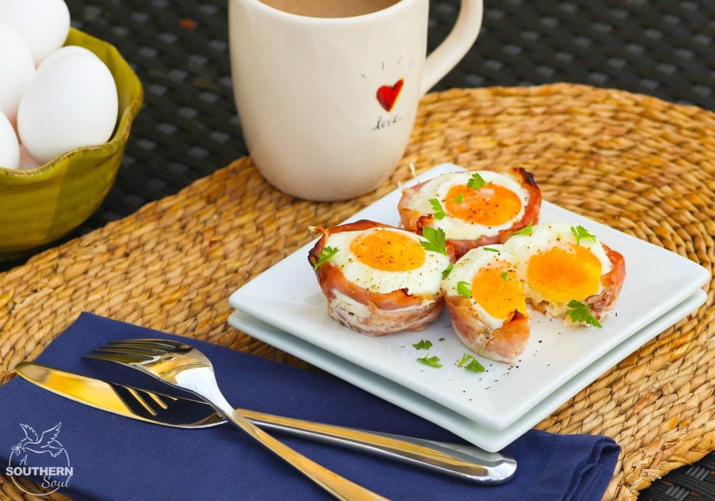 Ham and Cheese Egg Cups made in a muffin tin are a low carb breakfast that downright delicious. They are super easy to make with three ingredients are are ready to enjoy in less than 20 minutes.