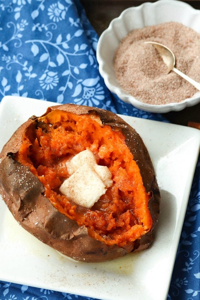 Sweet Potatoes cooked perfectly in the Air Fryer then seasoned with salt and cinnamon sugar along with butter is an amazing easy to make side dish.