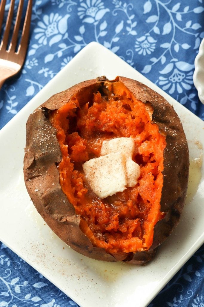 Sweet Potatoes cooked perfectly in the Air Fryer then seasoned with salt and cinnamon sugar along with butter is an amazing easy to make side dish.