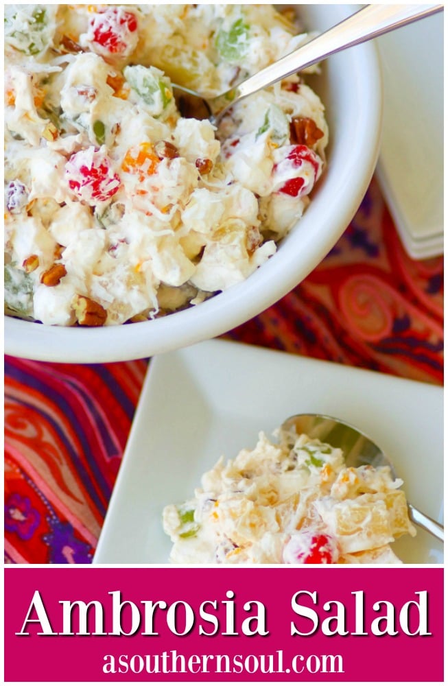 Ambrosia salad made with oranges, cherries, pineapple and marshmallows is tossed in a light fluffy mixture of fresh whipped cream with a touch of sour cream for extra flavor.