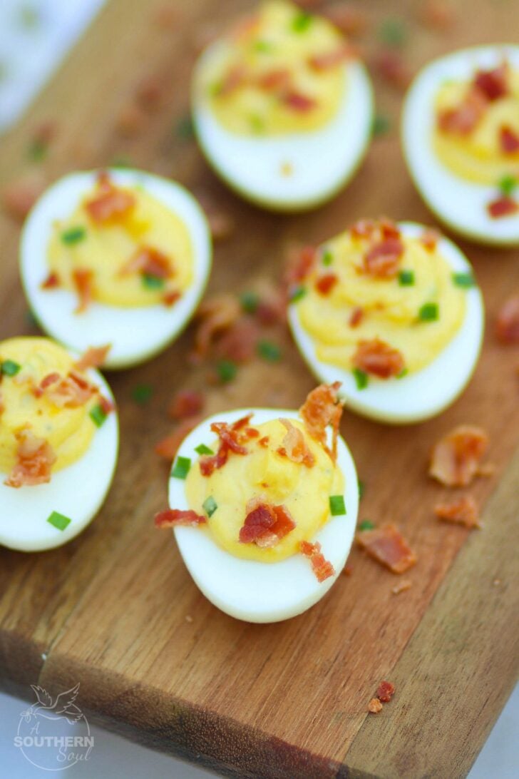 Bacon Deviled Eggs are creamy with just the right amount of mayonnaise plus an added tang of horseradish. Perfect for brunch, Easter, this holidays, baby and wedding showers.