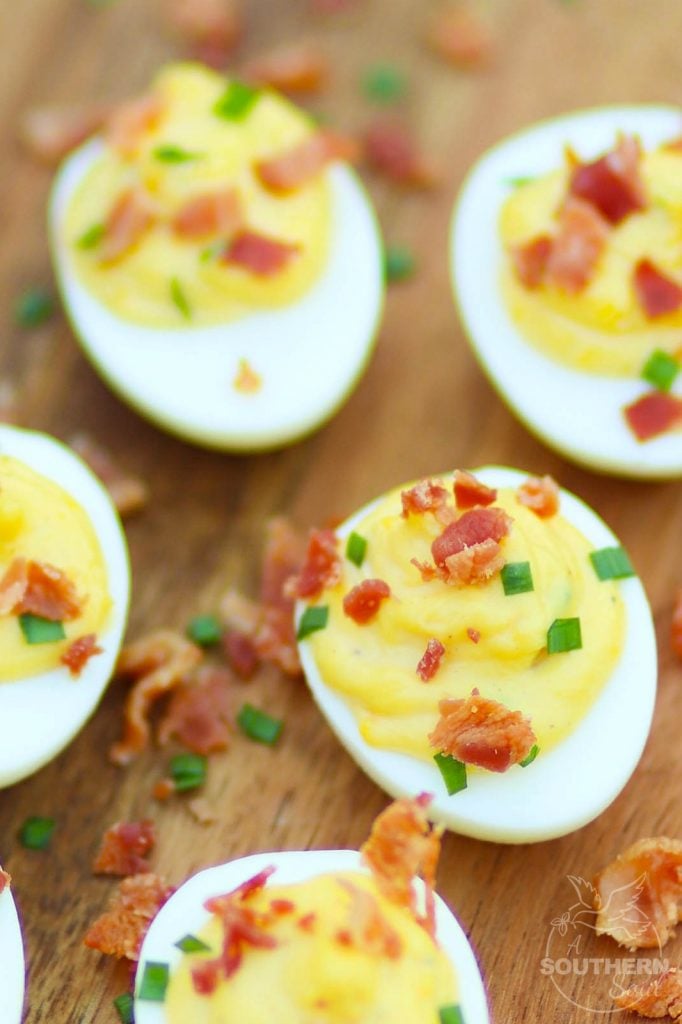 Bacon Deviled Eggs are creamy with just the right amount of mayonnaise plus an added tang of horseradish. Perfect for brunch, Easter, this holidays, baby and wedding showers.