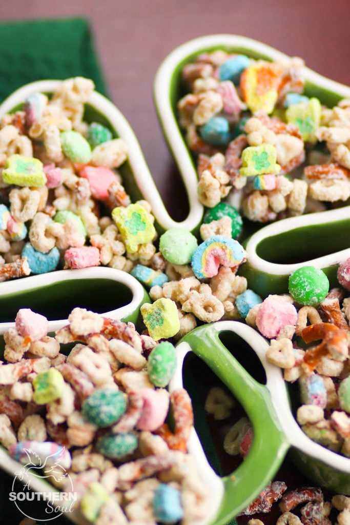 Lucky Charms Snack Mix made with cereal, pretzels, nuts and M&Ms for a sweet and salty treat that irresistible!