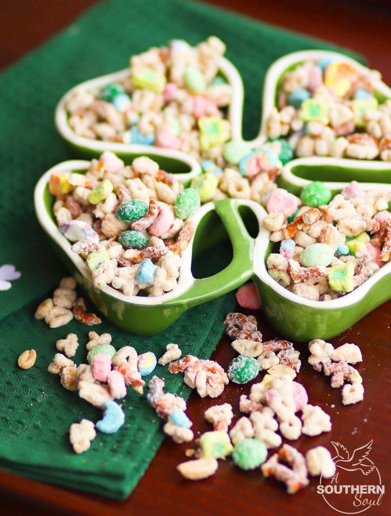Lucky Charms Snack Mix made with cereal, pretzels, nuts and M&Ms for a sweet and salty treat that irresistible!