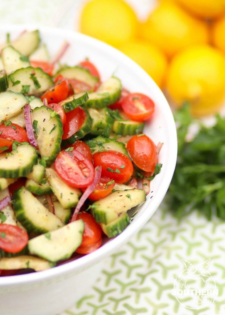 Tomato Cucumber Salad made with fresh vegetables is a simple salad with a healthy dressing of olive oil, balsamic vinegar, lemon juice and herbs.