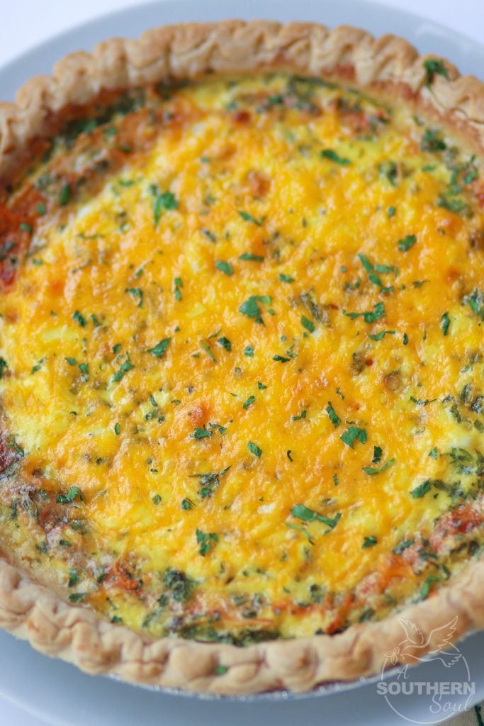 Easy to make Three Cheese Quiche made with cheddar, mozzerella and Parmesan is a great main dish for breakfast, brunch or a weeknight meal.