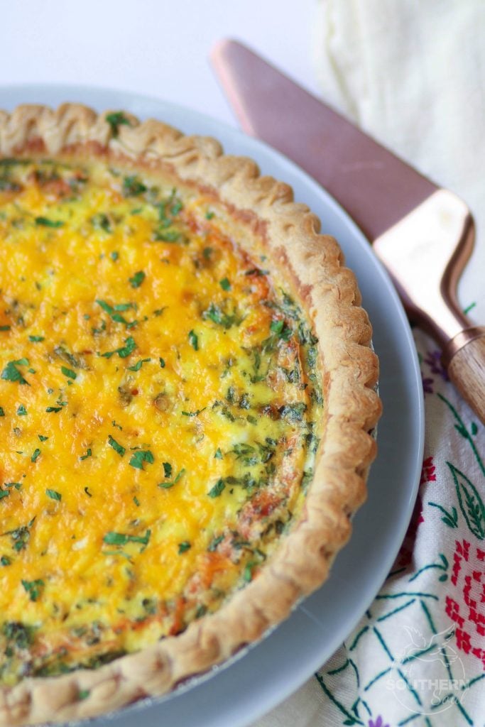 Easy to make Three Cheese Quiche made with cheddar, mozzerella and Parmesan is a great main dish for breakfast, brunch or a weeknight meal.