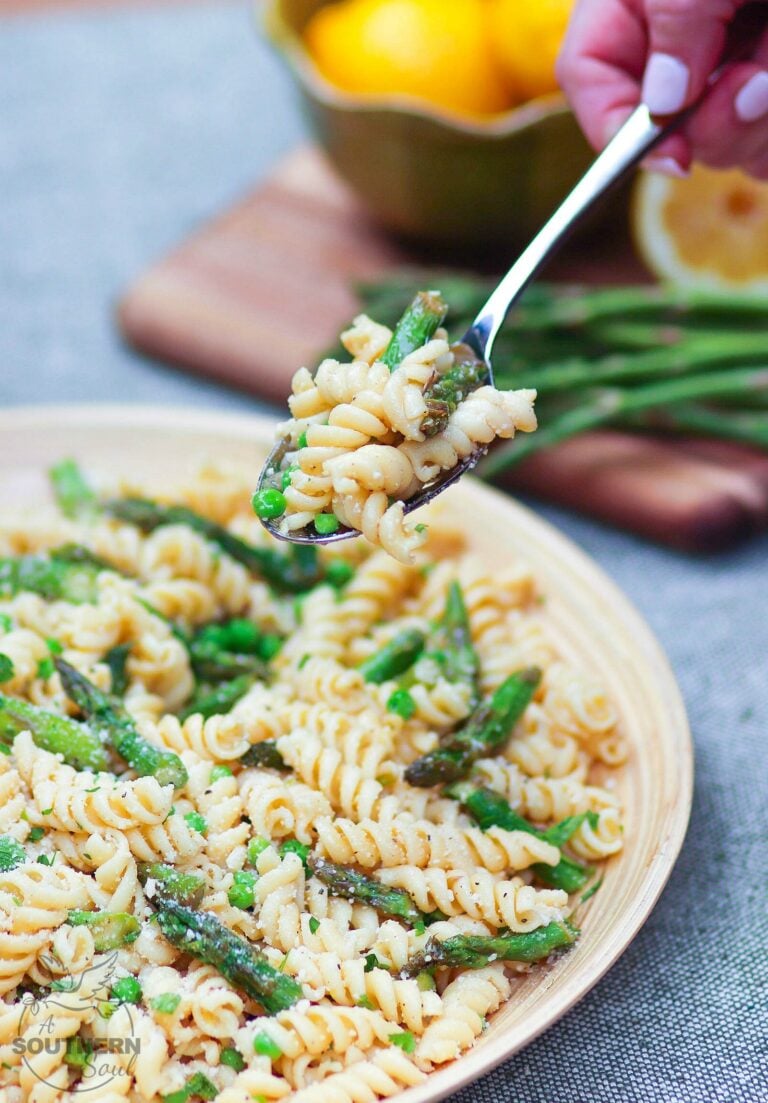 Tender pasta, with fresh sauteed asparagus and sweet peas tossed in a bright lemony dressing is a salad that's easy to make and full of flavor!