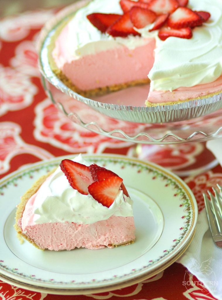 Strawberry Cream Pie made with fresh whipped cream and strawberry jello is an easy to make dessert that is cool and delicious. It's perfect for the holidays, potluck or covered dish suppers or a weeknight meal.