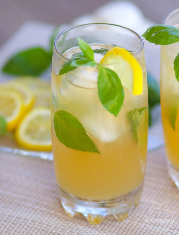 Lemonade made extra special with basil and bourbon is a drink perfect for derby day or to sip on any time of the year!