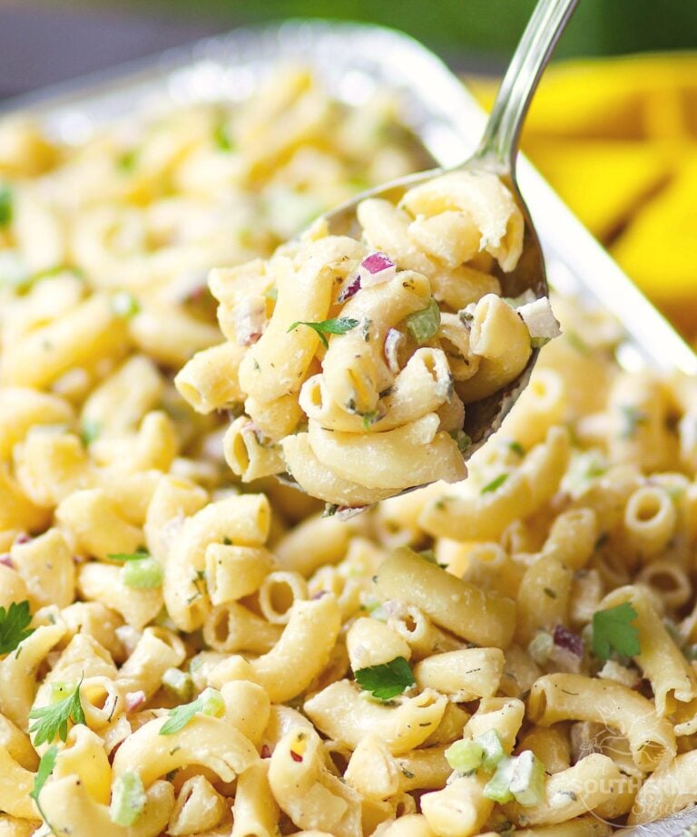 Macaroni Salad for a crowd is an easy to make recipe for potlucks, covered dish suppers and when you're entertaining. With celery, onion and a simple dressing it's always a crowd pleaser.