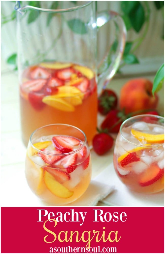 Rose sangria flavored with peach schnapps, peach juice with fresh fruit is a cool drink that's excellent for summertime!,