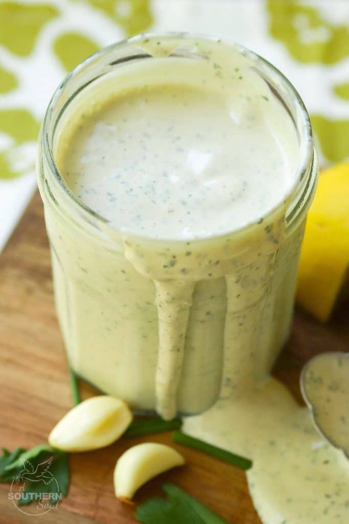 Green Goddess Dressing made with chives, parsley, garlic mayonnaise, sour cream and a few other ingredients is a classic recipe for salads, fish and pasta.