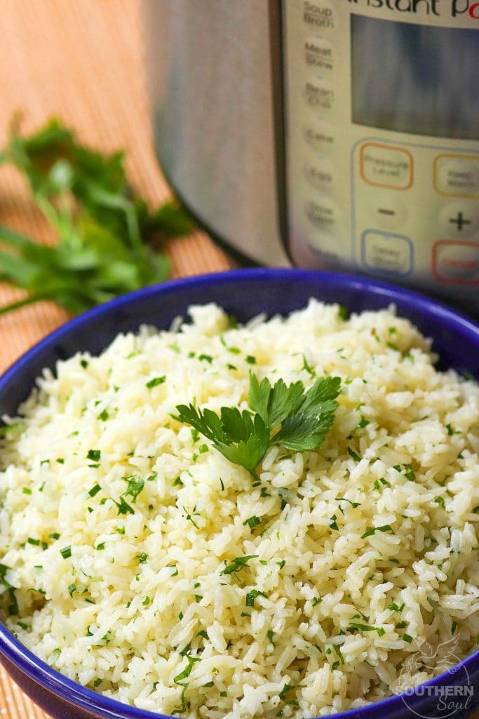 Rice made in the Instant Pot with garlic, fresh parsley and chives, along with butter is an easy to make side dish that turns out perfectly every time!