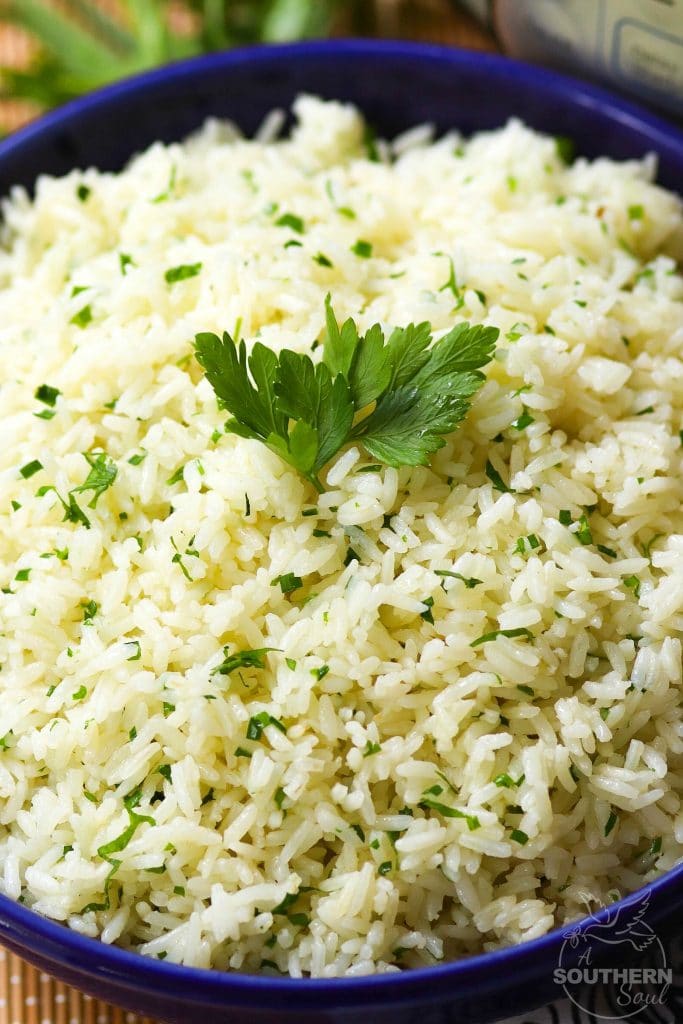 Rice made in the Instant Pot with garlic, fresh parsley and chives, along with butter is an easy to make side dish that turns out perfectly every time!