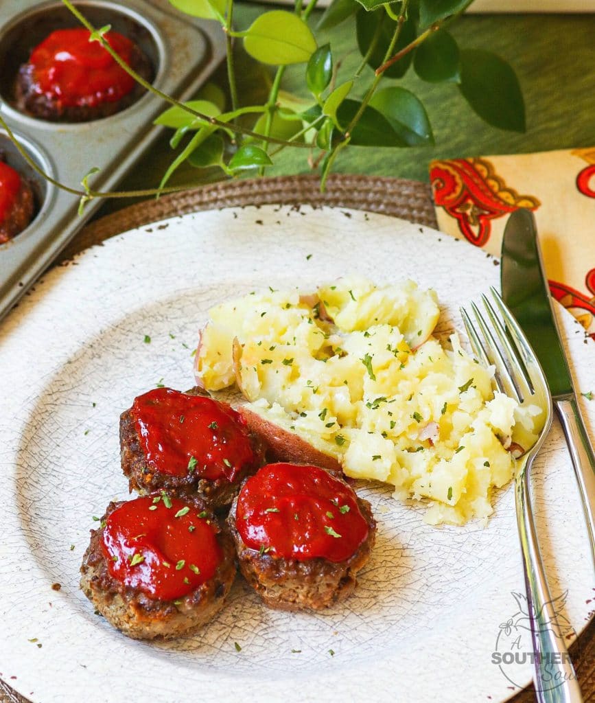 Meatloaf Muffins made with ground beef, eggs, bread crumbs, Parmesan Cheese and seasoned to perfect are easy to make and perfect for a weeknight meal!