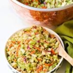 Ramen Broccoli Slaw made with toasted, packaged noodles, broccoli, carrots, green onion and a savory sweet dressing is a delicious side dish. Perfect for a weeknight meal, cookout, pot luck or covered dish supper.
