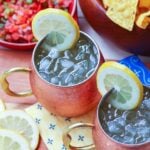 Refreshing lemon shandy made with your favorite beer, lemonade and a twist of lemon is a great drink for summer, tailgating, game day or backyard cookouts.