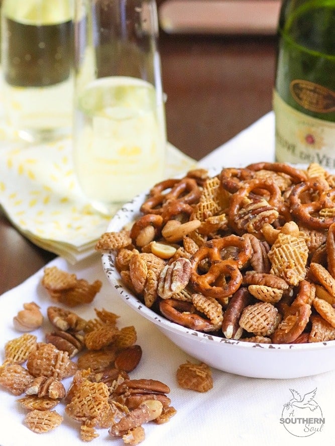 Sweet and Nutty Snack Mix made with brown sugar, butter and corn syrup, them baked until golden brown is a snack that's totally irresistible!