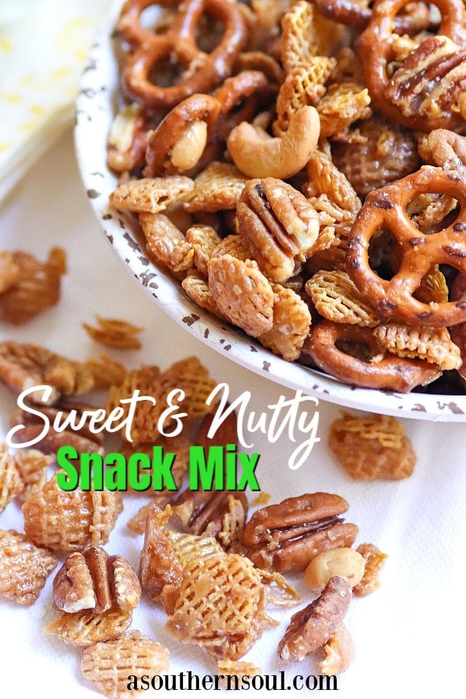 Sweet and Nutty Snack Mix made with brown sugar, butter and corn syrup, them baked until golden brown is a snack that's totally irresistible!