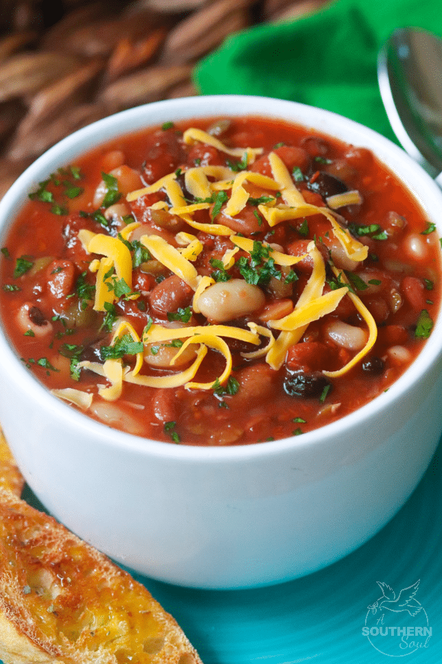 15 Bean Soup made with protein packed bean cooked in vegetable stock with crushed tomatoes, onions, garlic and seasonings is a bowl full of comfort!