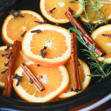Fall Potpourri made in the crock pot with oranges, cinnamon, clove and rosemary fill your house with beautiful fresh scents.