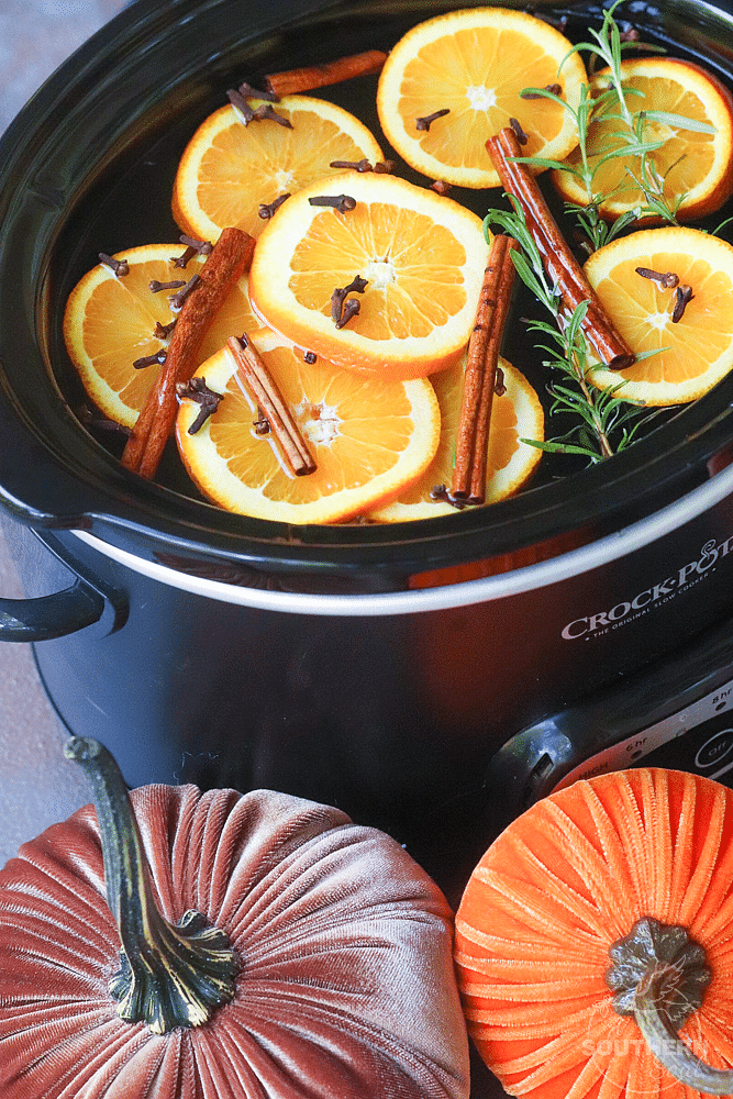 Fall Potpourri made in the crock pot with oranges, cinnamon, clove and rosemary fill your house with beautiful fresh scents.