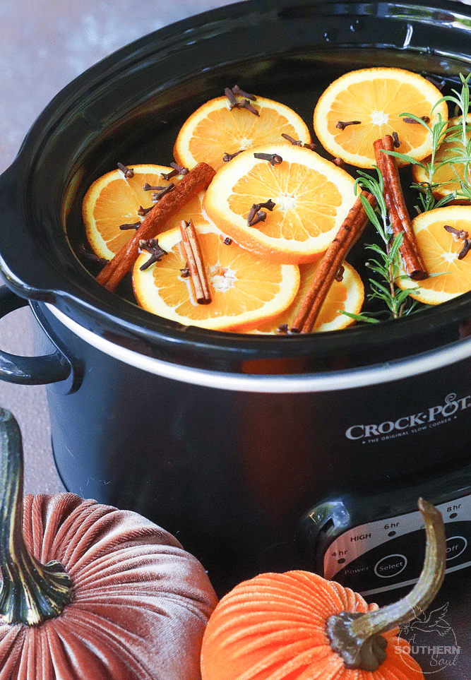 Fall Potpourri made in the crock pot with oranges, cinnamon, clove and rosemary fill your house with beautiful fresh scents.