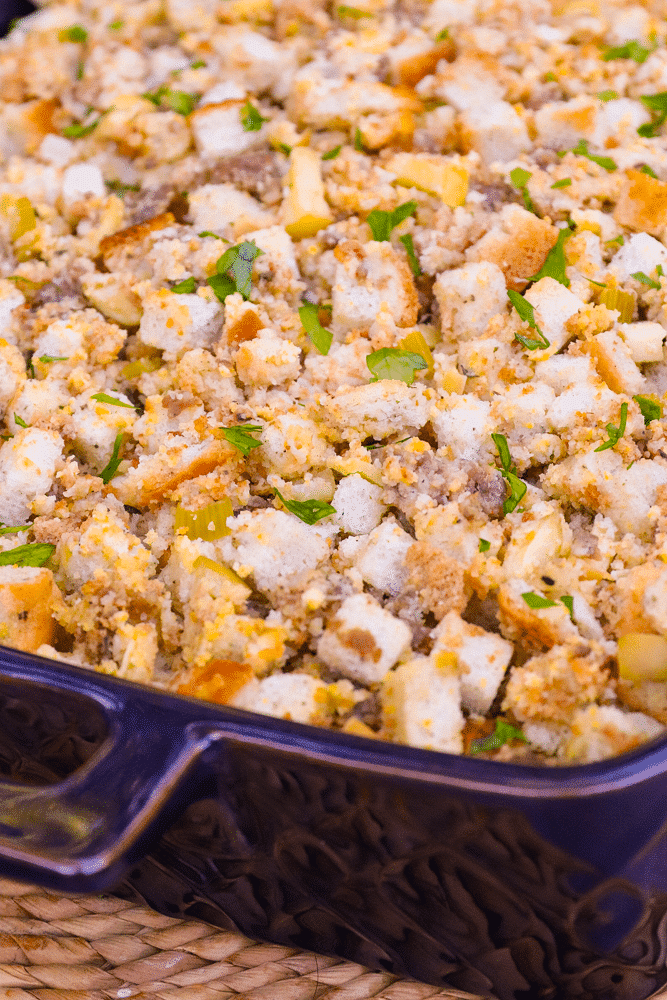 Apple Sausage Dressing is an easy to make recipe that's perfect for the holidays. Made with apples, sausage, herbs, spices and two kinds of bread, this side is great with turkey, pork and ideal served with gravy.