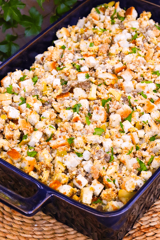 Apple Sausage Dressing is an easy to make recipe that's perfect for the holidays. Made with apples, sausage, herbs, spices and two kinds of bread, this side is great with turkey, pork and ideal served with gravy.