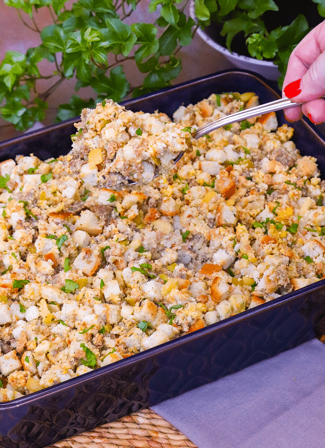 Apple Sausage Dressing is an easy to make recipe that's perfect for the holidays. Made with apples, sausage, herbs, spices and two kinds of bread, this side is great with turkey, pork and ideal served with gravy.