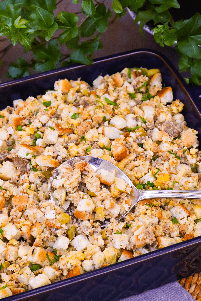 Apple Sausage Dressing is an easy to make recipe that's perfect for the holidays. Made with apples, sausage, herbs, spices and two kinds of bread, this side is great with turkey, pork and ideal served with gravy.