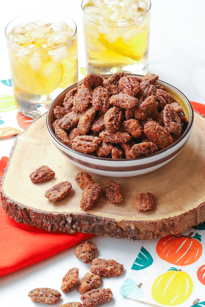 Candied Pecans made with brown sugar, cinnamon, egg whites with a touch of heat are an irresistible treat! As an appetizers, snack or on salads and sides dishes they are delicious. They also make a wonderful homemade gift.