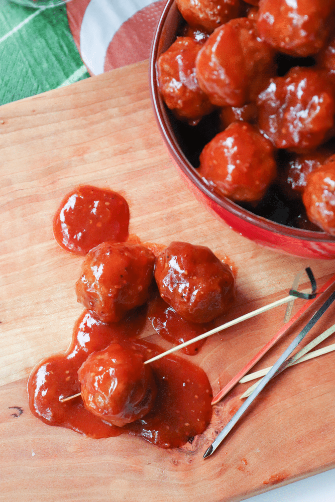 Beefy meatballs, cooked low and slow in the Crock Pot in a sauce made with BBQ sauce, apricot preserves and whole grain mustard are perfect for game day!