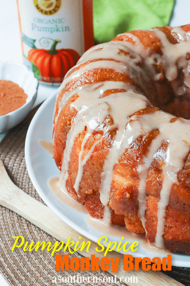 Pumpkin Spice Monkey Bread made with biscuits, spices, cream cheese and pumpkin is a fall treat that's over the top delicious! This easy to make bread is great as a dessert, snack or served for brunch.