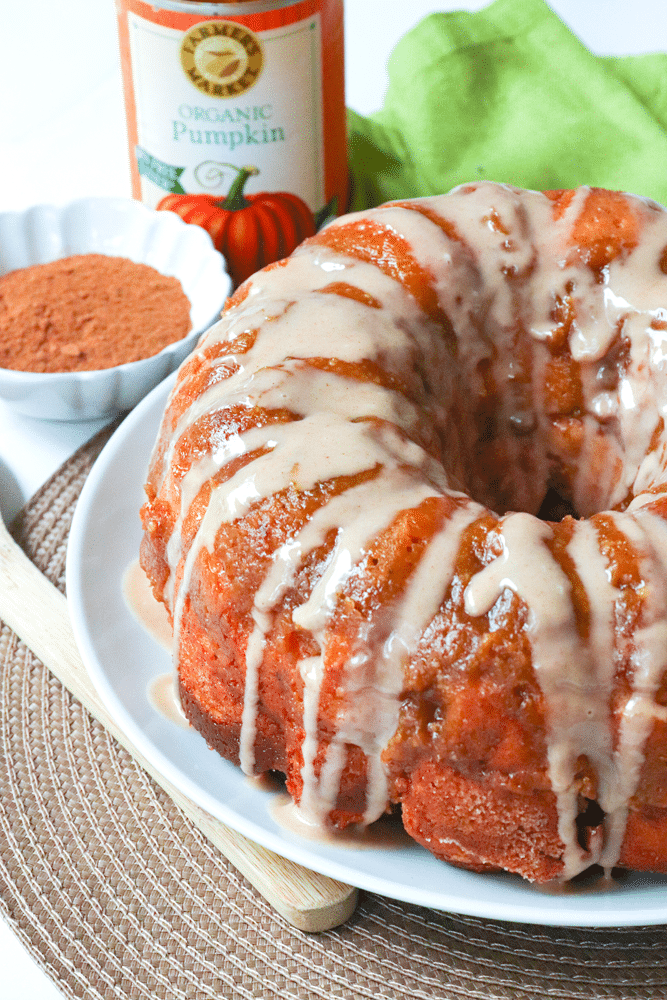 Pumpkin Spice Monkey Bread made with biscuits, spices, cream cheese and pumpkin is a fall treat that's over the top delicious! This easy to make bread is great as a dessert, snack or served for brunch.